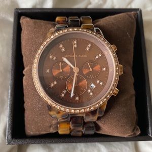 Michael Kor’s tortoise shell watch